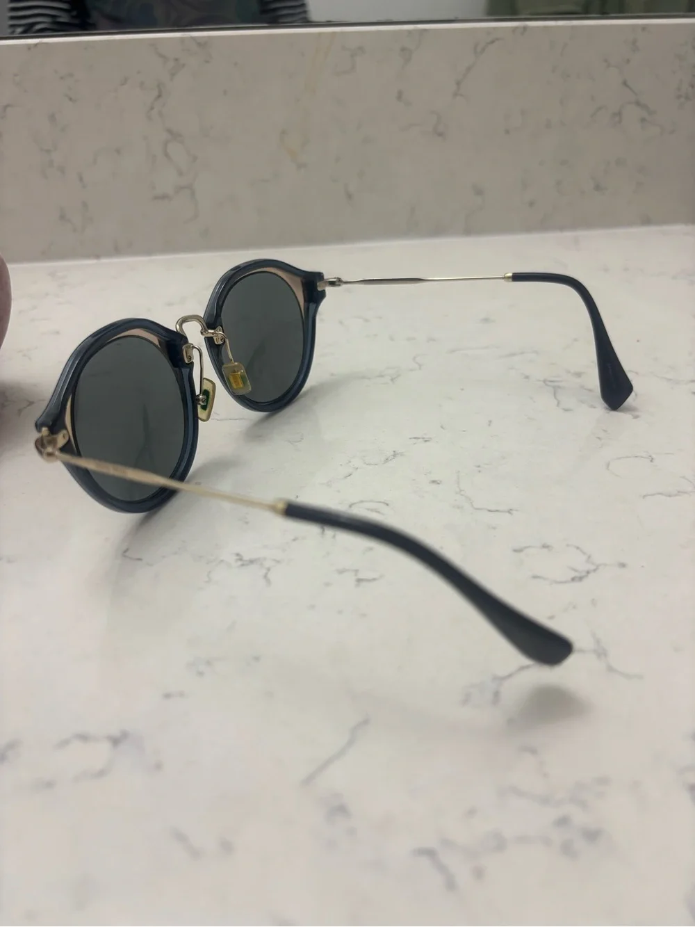 Miu Miu Black Round Sunglasses with Gold Bridge